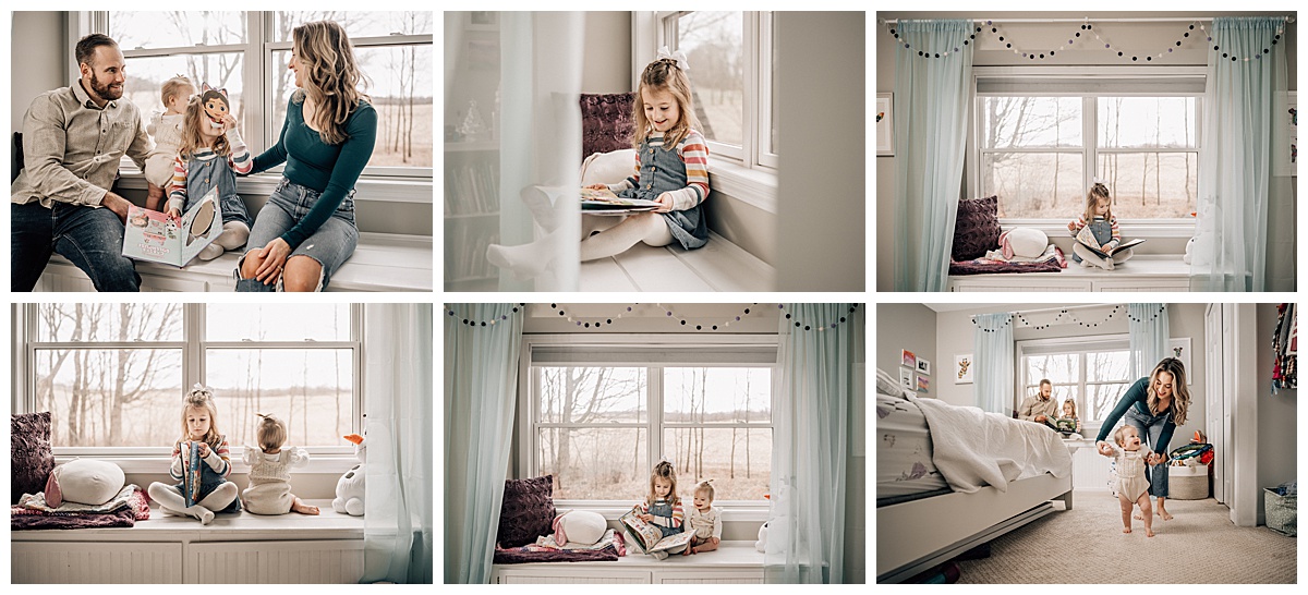 Little girl reads a book on her window sill. Mom and Dad and baby sister are also in bedroom.