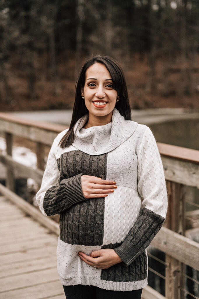 Maternity portrait highlighting baby bump, documenting the first year of newborn photos before baby arrives.